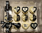Cupcakes with Chanel logo in a clear box